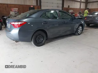 2015 Toyota Corolla L with VIN 2T1BURHE9FC356561, listed as a IAAI auction lot 42224561 with 121,288 mi miles and . Bid and sale history available at DreamBid. Image 4.