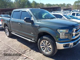 2015 Ford F-150 XLT with VIN 1FTEW1EG2FFC68540, listed as a IAAI auction lot 41586078 with 207,095 mi miles. Bid and sale history available at carsss.com. Image 1.