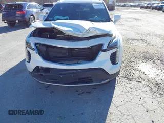 2022 Cadillac XT4 AWD Premium Luxury with VIN 1GYFZDR41NF105299, listed as a IAAI auction lot 41257154 with 34,904 mi miles and . Bid and sale history available at carsss.com. Image 6.
