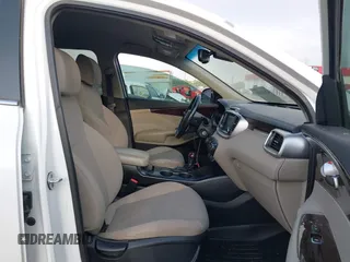 2017 Kia Sorento LX with VIN 5XYPG4A35HG205801, listed as a IAAI auction lot 42143064 with 129,647 mi miles. Bid and sale history available at carsss.com. Image 5.