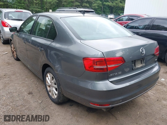2015 Volkswagen Jetta SE z VIN 3VWD17AJ5FM285988, wystawiony jako IAAI lot #42675179 z przebiegiem 150 815 mil mil oraz . Historia ofert i sprzedaży dostępna na DreamBid. Obrazek 3.