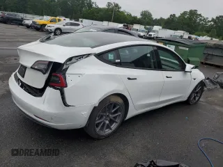 2023 Tesla Model 3 with VIN 5YJ3E1EA0PF463239, listed as a Copart auction lot 59770525 with 48,086 mi miles and Clean title. Bid and sale history available at DreamBid. Image 3.