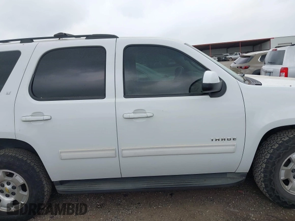 2011 Chevrolet Tahoe LT with VIN 1GNSCBE0XBR256687, listed as a IAAI auction lot 41948765 with 232,954 mi miles and . Bid and sale history available at DreamBid. Image 13.