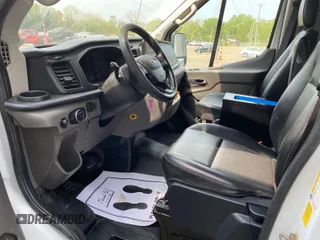 2020 Ford Transit Cargo with VIN 1FTBR1CG6LKA17312, listed as a IAAI auction lot 42284054 with 173,479 mi miles and . Bid and sale history available at DreamBid. Image 16.
