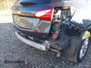 2019 Chevrolet Equinox LT z VIN 3GNAXKEVXKL243487, wystawiony jako IAAI lot #41217077 z przebiegiem 62 119 mil mil oraz . Historia ofert i sprzedaży dostępna na DreamBid. Obrazek 6.