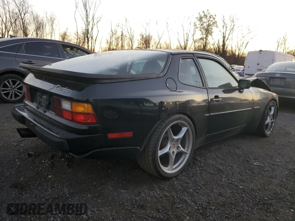 1986 Porsche 944 with VIN WP0AA0951GN156691, listed as a Copart auction lot 79901794 with 694,360 mi miles and Salvage Title. Bid and sale history available at DreamBid. Image 3.
