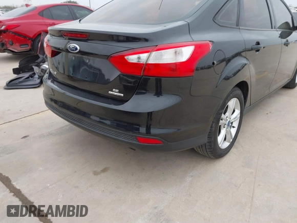 2013 Ford Focus SE with VIN 1FADP3F29DL157950, listed as a IAAI auction lot 41617844 with 128,890 mi miles. Bid and sale history available at carsss.com. Image 4.