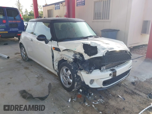 2011 MINI Hardtop with VIN WMWSU3C5XBT095591, listed as a IAAI auction lot 42366393 with 99,092 mi miles and . Bid and sale history available at DreamBid. Image 1.