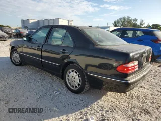 2002 Mercedes-Benz E-Class with VIN WDBJF82J42X064476, listed as a Copart auction lot 88268595 with 75,498 mi miles and Clean Title. Bid and sale history available at carsss.com. Image 2.