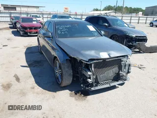 2018 Mercedes-Benz E-Class E 300 with VIN WDDZF4JB1JA310799, listed as a IAAI auction lot 41754736 with 74,233 mi miles. Bid and sale history available at carsss.com. Image 1.