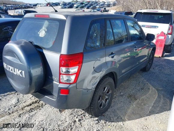 2007 Suzuki Grand Vitara with VIN JS3TE941974200708, listed as a IAAI auction lot 41589258 with 207,472 mi miles. Bid and sale history available at carsss.com. Image 4.