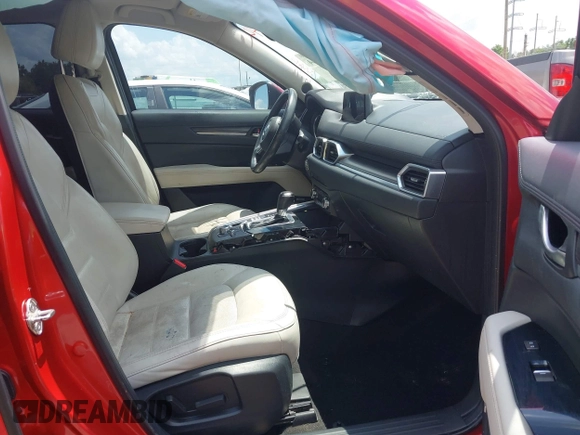 2018 Mazda CX-5 Grand Touring with VIN JM3KFADM4J0335913, listed as a IAAI auction lot 42326044 with 104,583 mi miles and . Bid and sale history available at DreamBid. Image 5.