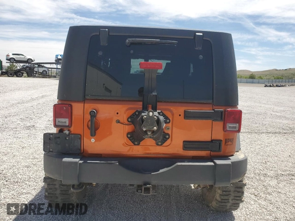 2010 Jeep Wrangler Rubicon with VIN 1J4BA6D12AL186887, listed as a Copart auction lot 57902545 with Not provided miles and Salvage title. Bid and sale history available at DreamBid. Image 6.