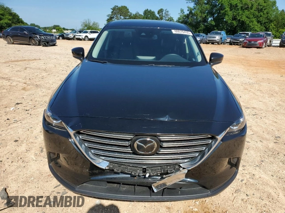 2023 Mazda CX-9 Touring with VIN JM3TCBCY3P0655644, listed as a Copart auction lot 60078435 with 17,496 mi miles and Salvage title. Bid and sale history available at DreamBid. Image 5.