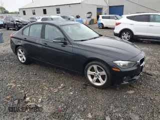2013 BMW 3 Series 328i xDrive with VIN WBA3B5C53DF595177, listed as a Copart auction lot 57024375 with 124,873 mi miles and Salvage title. Bid and sale history available at DreamBid. Image 4.