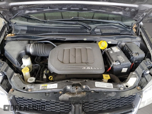 2014 Dodge Grand Caravan SE with VIN 2C4RDGBG6ER463529, listed as a Copart auction lot 51830695 with 105,675 mi miles and Salvage Title. Bid and sale history available at DreamBid. Image 12.
