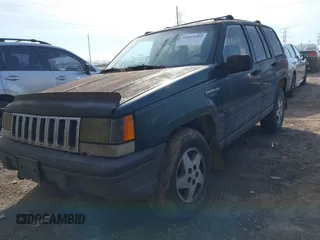 1993 Jeep Grand Cherokee Laredo with VIN 1J4GZ58S1PC680016, listed as a IAAI auction lot 41813392 with 149,520 mi miles. Bid and sale history available at carsss.com. Image 2.