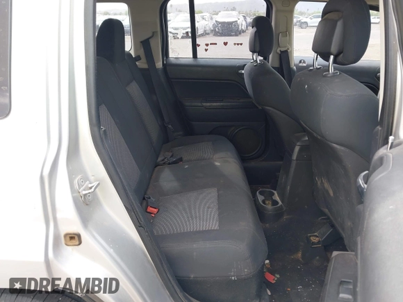 2010 Jeep Patriot Sport with VIN 1J4NT2GB7AD529286, listed as a IAAI auction lot 42020227 with 158,401 mi miles. Bid and sale history available at carsss.com. Image 8.