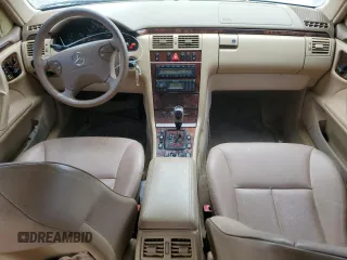 2001 Mercedes-Benz E-Class with VIN WDBJF70J51B332881, listed as a Copart auction lot 63487844 with 216,080 mi miles and Salvage Title. Bid and sale history available at carsss.com. Image 8.