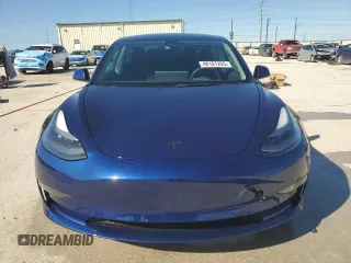 2022 Tesla Model 3 with VIN 5YJ3E1EA8NF322335, listed as a Copart auction lot 48187265 with 22,265 mi miles and Clean Title. Bid and sale history available at DreamBid. Image 5.
