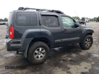 2012 Nissan Xterra X with VIN 5N1AN0NW0CC503500, listed as a Copart auction lot 71752364 with 139,892 mi miles and Salvage Title. Bid and sale history available at DreamBid. Image 3.