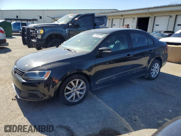 2011 Volkswagen Jetta SE with VIN 3VWDX7AJ2BM013018, listed as a Copart auction lot 73686974 with 145,557 mi miles and Salvage title. Bid and sale history available at DreamBid. Image 1.