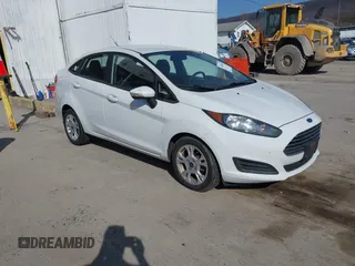 2014 Ford Fiesta SE z VIN 3FADP4BJ4EM148124, wystawiony jako IAAI lot #41741873 z przebiegiem 99 651 mil mil oraz . Historia ofert i sprzedaży dostępna na DreamBid. Obrazek 1.