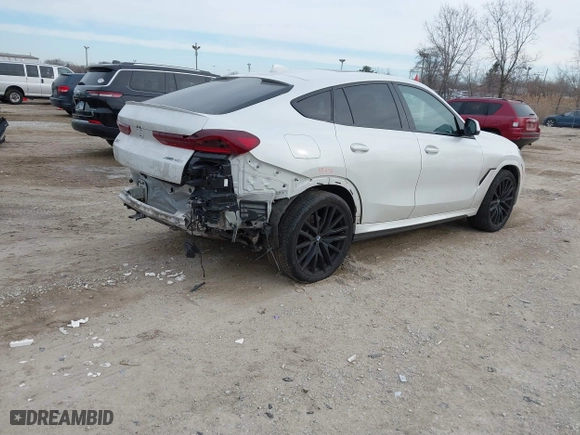 2023 BMW X6 xDrive40i with VIN 5UXCY6C08P9P28397, listed as a IAAI auction lot 41325621 with 66,412 mi miles. Bid and sale history available at carsss.com. Image 4.