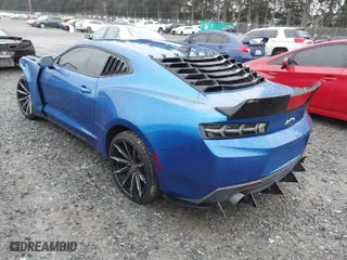 2016 Chevrolet Camaro 1LT with VIN 1G1FA1RX5G0165333, listed as a IAAI auction lot 41856530 with 118,923 mi miles. Bid and sale history available at carsss.com. Image 3.