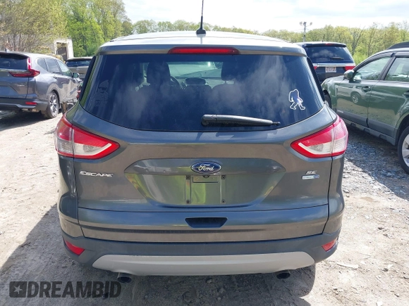 2016 Ford Escape SE z VIN 1FMCU9GX2GUA47702, wystawiony jako IAAI lot #42160145 z przebiegiem 90 765 mil mil oraz . Historia ofert i sprzedaży dostępna na DreamBid. Obrazek 17.