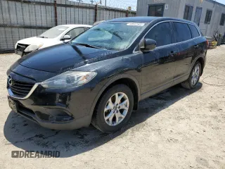 2015 Mazda CX-9 Sport z VIN JM3TB2BAXF0447315, wystawiony jako Copart lot #60842505 z przebiegiem 122 281 mil mil oraz Szkoda całkowita • Salvage title. Historia ofert i sprzedaży dostępna na DreamBid. Obrazek 1.