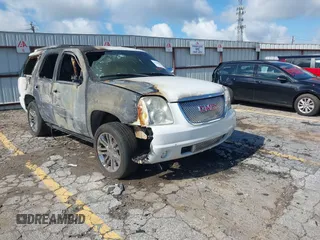 2007 GMC Yukon Denali z VIN 1GKFK63857J335272, wystawiony jako IAAI lot #42280229 z przebiegiem Nie podano mil oraz . Historia ofert i sprzedaży dostępna na DreamBid. Obrazek 1.