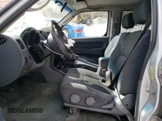 2004 Nissan Frontier SC z VIN 1N6MD29Y64C422771, wystawiony jako Copart lot #47132115 z przebiegiem 151 009 mil mil oraz Szkoda całkowita • Salvage title. Historia ofert i sprzedaży dostępna na DreamBid. Obrazek 7.