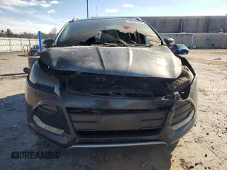 2014 Ford Escape Titanium with VIN 1FMCU0JX0EUD43299, listed as a Copart auction lot 49587535 with 0 mi miles and Salvage Title. Bid and sale history available at carsss.com. Image 5.