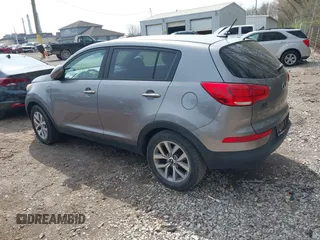 2015 Kia Sportage LX with VIN KNDPBCAC6F7790469, listed as a IAAI auction lot 41942732 with 74,612 mi miles and . Bid and sale history available at DreamBid. Image 3.