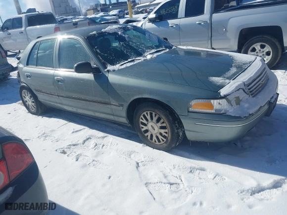 2005 Ford Crown Victoria LX with VIN 2FAFP74W85X131494, listed as a IAAI auction lot 41620849 with 127,245 mi miles. Bid and sale history available at carsss.com. Image 1.