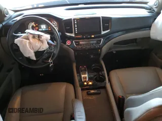 2018 Honda Pilot Touring с VIN 5FNYF6H98JB053524, выставлен на аукционе Copart как лот 61447785 с пробегом 114 942 миль миль и Списание • Salvage title. История ставок и продаж доступна на DreamBid. Изображение 8.