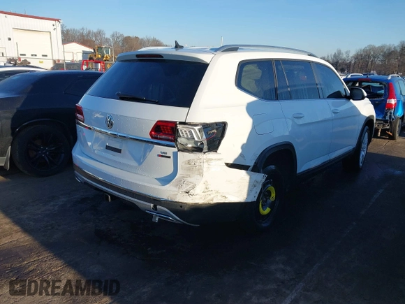 2019 Volkswagen Atlas SEL with VIN 1V2MR2CA2KC522314, listed as a IAAI auction lot 41487693 with 71,053 mi miles and . Bid and sale history available at DreamBid. Image 4.