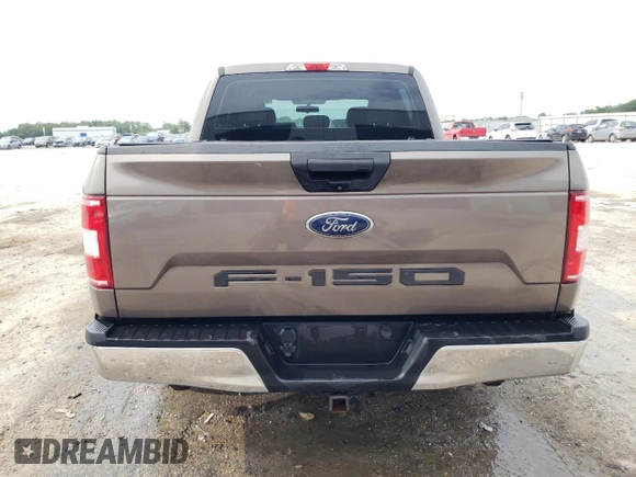 2018 Ford F-150 XL with VIN 1FTEW1CB3JFB73176, listed as a Copart auction lot 58741785 with 153,162 mi miles and Salvage title. Bid and sale history available at DreamBid. Image 6.