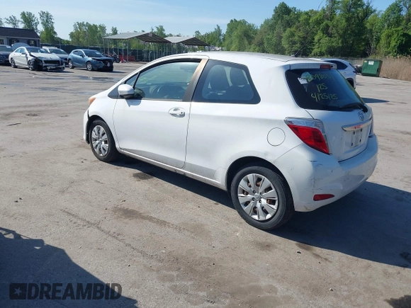 2014 Toyota Yaris L with VIN VNKJTUD35EA011933, listed as a IAAI auction lot 42150303 with 114,369 mi miles. Bid and sale history available at carsss.com. Image 3.