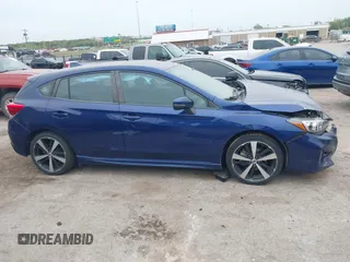 2017 Subaru Impreza Special Sports z VIN 4S3GTAM62H3700557, wystawiony jako IAAI lot #42055439 z przebiegiem 94 920 mil mil oraz . Historia ofert i sprzedaży dostępna na DreamBid. Obrazek 12.
