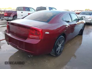 2006 Dodge Charger R/T with VIN 2B3KA53H36H260418, listed as a IAAI auction lot 42126007 with 242,331 mi miles and . Bid and sale history available at carsss.com. Image 4.