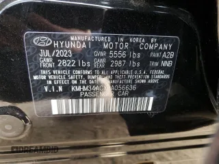 2024 Hyundai IONIQ 6 SEL with VIN KMHM34ACXRA056636, listed as a Copart auction lot 86772594 with 7,054 mi miles and Salvage Title. Bid and sale history available at carsss.com. Image 12.