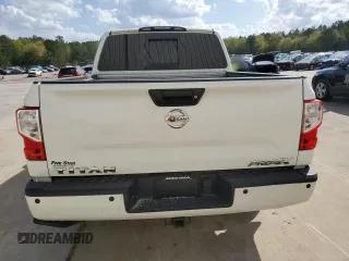 2019 Nissan Titan Pro-4X z VIN 1N6AA1E51KN526104, wystawiony jako Copart lot #51694335 z przebiegiem 56 620 mil mil oraz Szkoda całkowita • Salvage title. Historia ofert i sprzedaży dostępna na DreamBid. Obrazek 6.