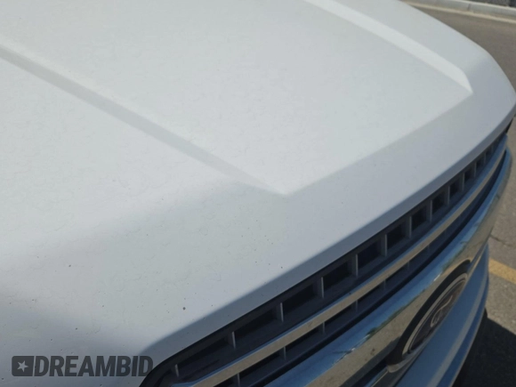 2018 Ford F-150 XL with VIN 1FTEW1E59JKD11351, listed as a IAAI auction lot 42663848 with 128,761 mi miles and . Bid and sale history available at DreamBid. Image 4.
