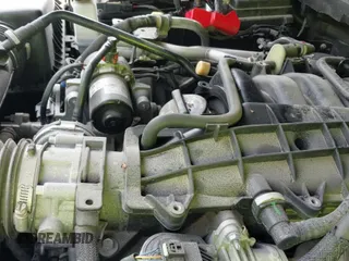 2022 Jeep Wrangler Unlimited Sahara Altitude with VIN 1C4HJXEG3NW148940, listed as a IAAI auction lot 43265258 with 53,047 mi miles and . Bid and sale history available at DreamBid. Image 21.