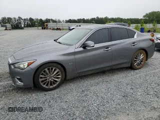 2019 Infiniti Q50 Luxe with VIN JN1EV7AP1KM512568, listed as a Copart auction lot 58692975 with 104,130 mi miles and Salvage title. Bid and sale history available at DreamBid. Image 1.