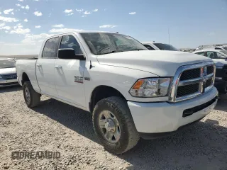 2014 Ram 2500 SLT with VIN 3C6TR5DT7EG217625, listed as a Copart auction lot 61656495 with 133,049 mi miles and Clean title. Bid and sale history available at DreamBid. Image 4.
