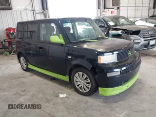 2006 Scion xB with VIN JTLKT324464098389, listed as a IAAI auction lot 41874286 with 292,051 mi miles. Bid and sale history available at carsss.com. Image 1.