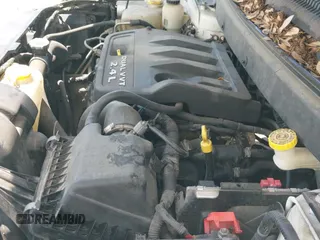 2012 Dodge Journey American Value z VIN 3C4PDCAB5CT207169, wystawiony jako IAAI lot #42357419 z przebiegiem 129 006 mil mil oraz . Historia ofert i sprzedaży dostępna na DreamBid. Obrazek 19.